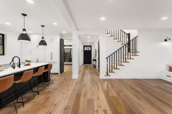 Warm hardwood flooring in an open-plan home